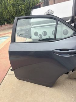LEFT REAR DOOR 2016 TOYOTA COROLLA LIGHT BLUE COLOR PAINT CODE (1F9).