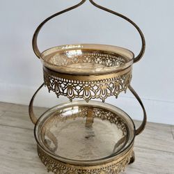 Two-tier antique-style metal stand with removable glass trays, perfect for displaying fruit or decorative accents