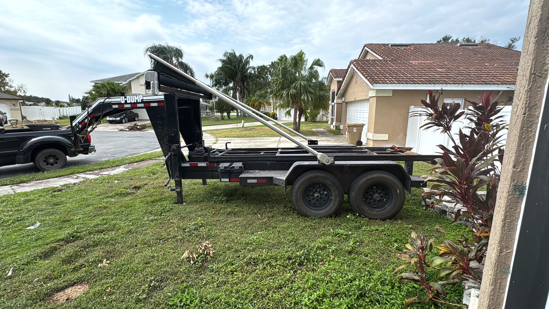 Trailer And 5 Dumpsters