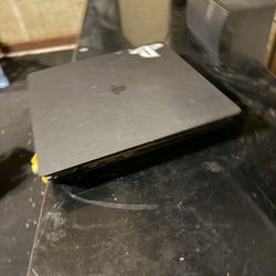 PS4 Slim with 2 controllers and games