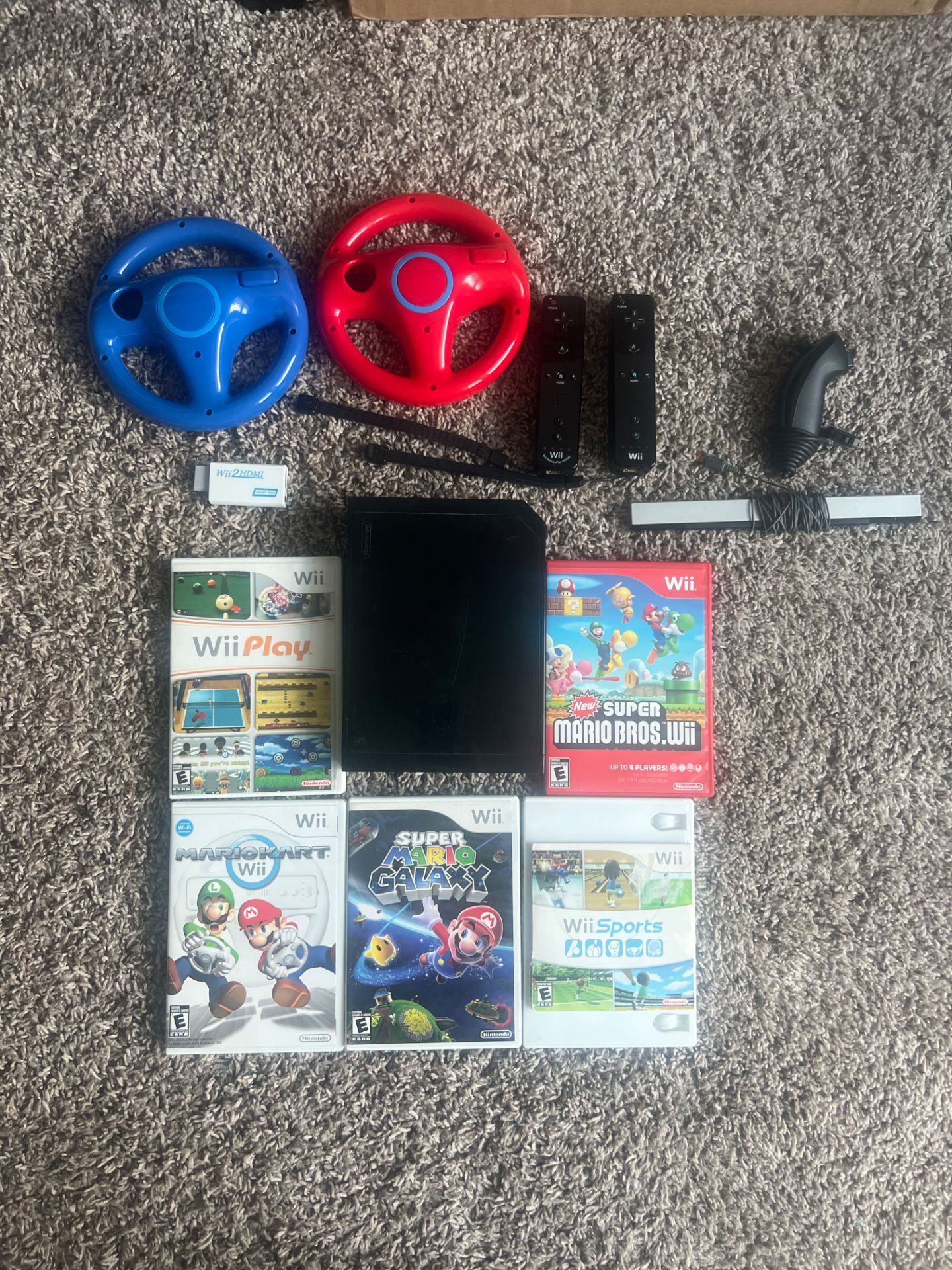 Black Nintendo Wii. Moded. Over 5p games plus additional games