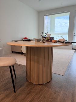 Round Wood Dining Table with Fluted Pedestal Base