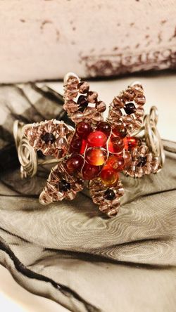 Artisan cuff bracelet in silver tone with red art glass