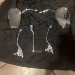 Heritage Harley parts, saddlebags, chaps, raincoat, windshield, mirrors, and levers and shifter