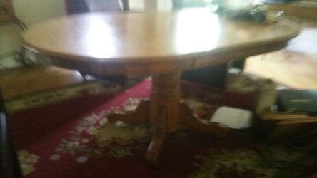 Old Solid round claw foot oak table/leaf and chairs