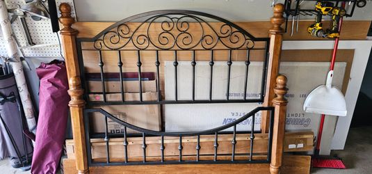 Wood and iron bed frame.