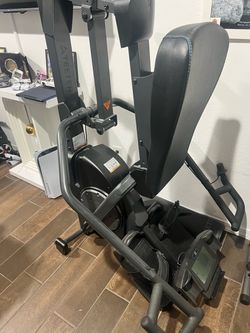 Teeter Rowing exercise machine
