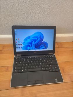 Dell laptop 14inch intel i5 8gb ram 256gb ssd, charger,ms office, adobe or best offers