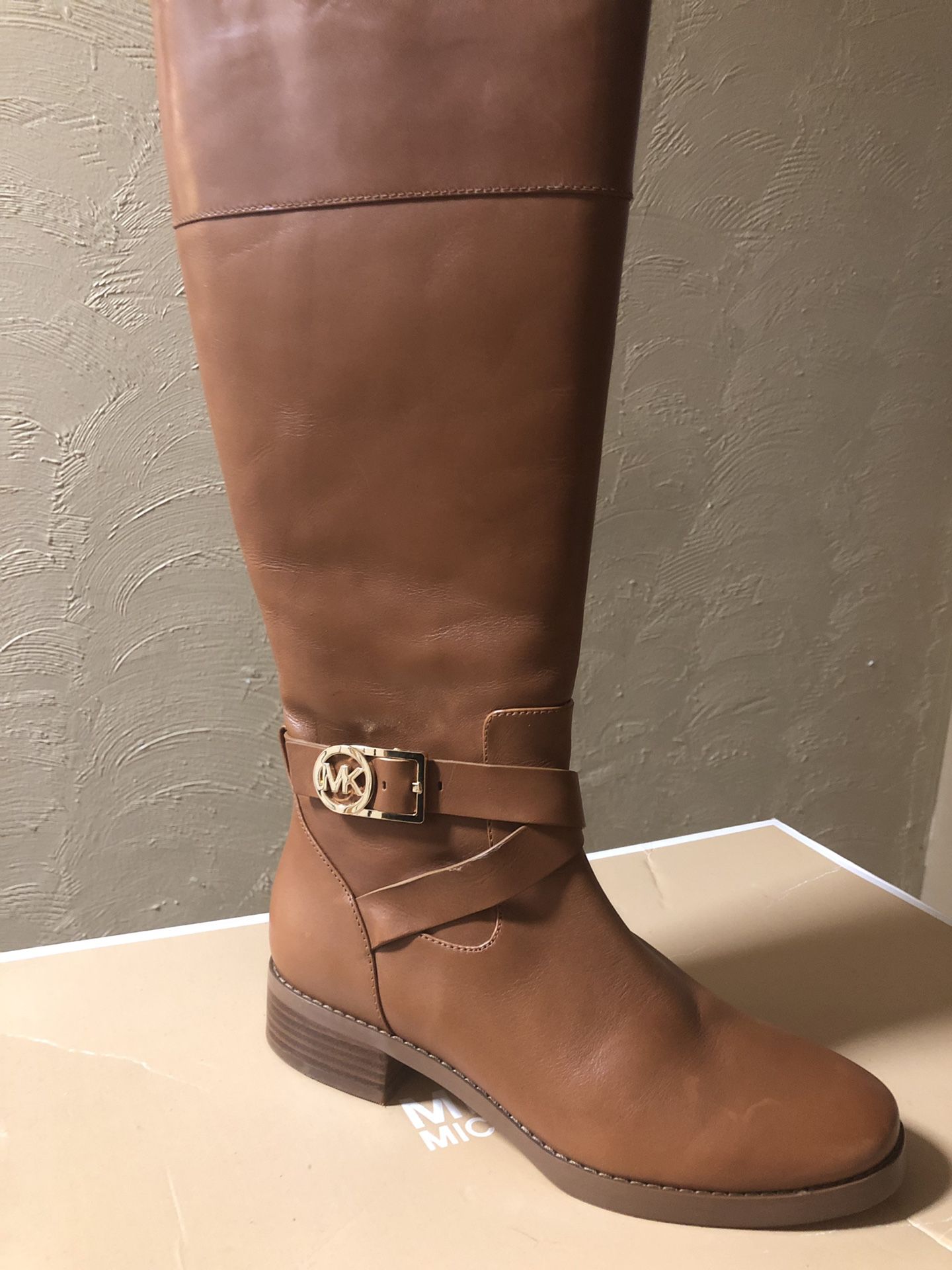 Michael Kors Luggage color boots.