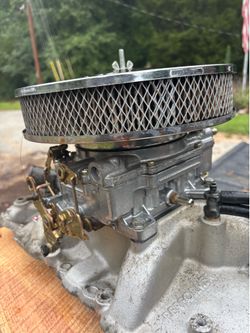 305 intake and 4 barrel