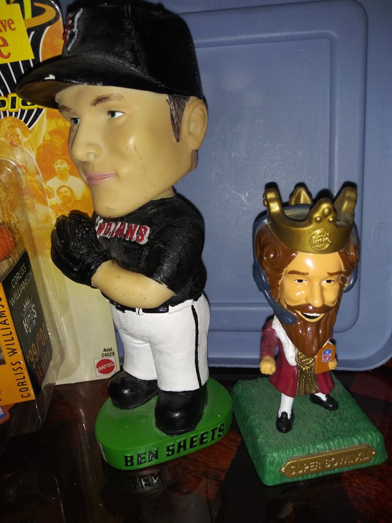 Bobble head. And NBA jam packaged Corless Williamson action figure