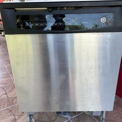 Whirlpool Quiet Dishwasher  stainless steel, and the garbage disposal