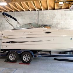 2000 Rinker siesta 243 with trailer.