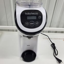 Formula Pro Mini w/ Rising Stand & extra dispenser piece.