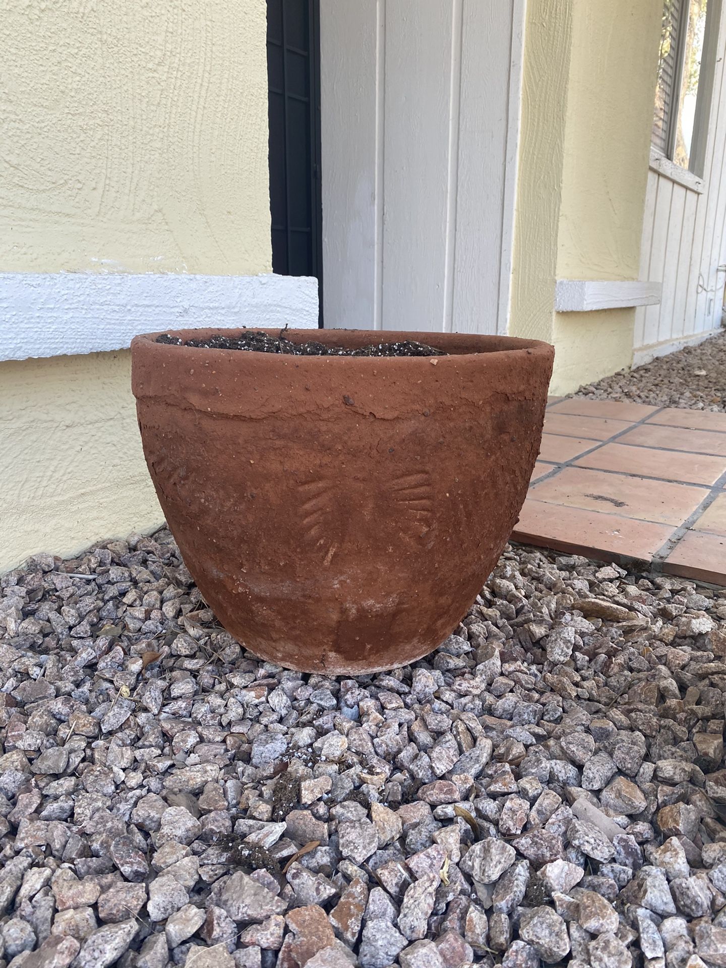 Terra-cotta pots with soil