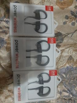 3 wireless bluetooth Ear headphones. NEW. 5 bucks for 3!!!!