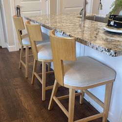 Three T-back barstools, contemporary