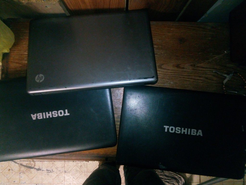 3 Laptops..2 Toshibas And 1 HP