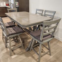 Expandable Dinning table with 6 rotating chairs