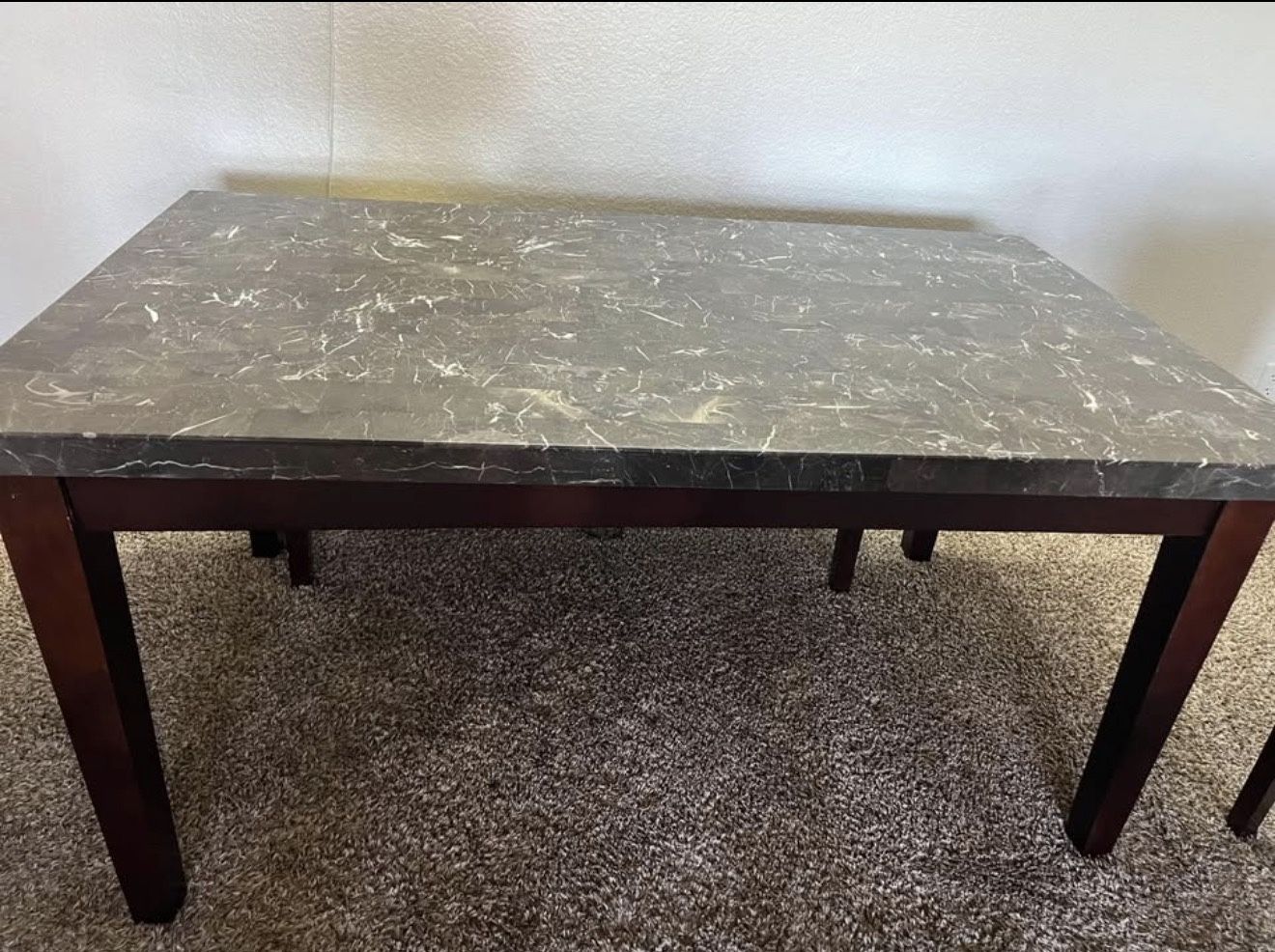 The marble table is very good, very light use