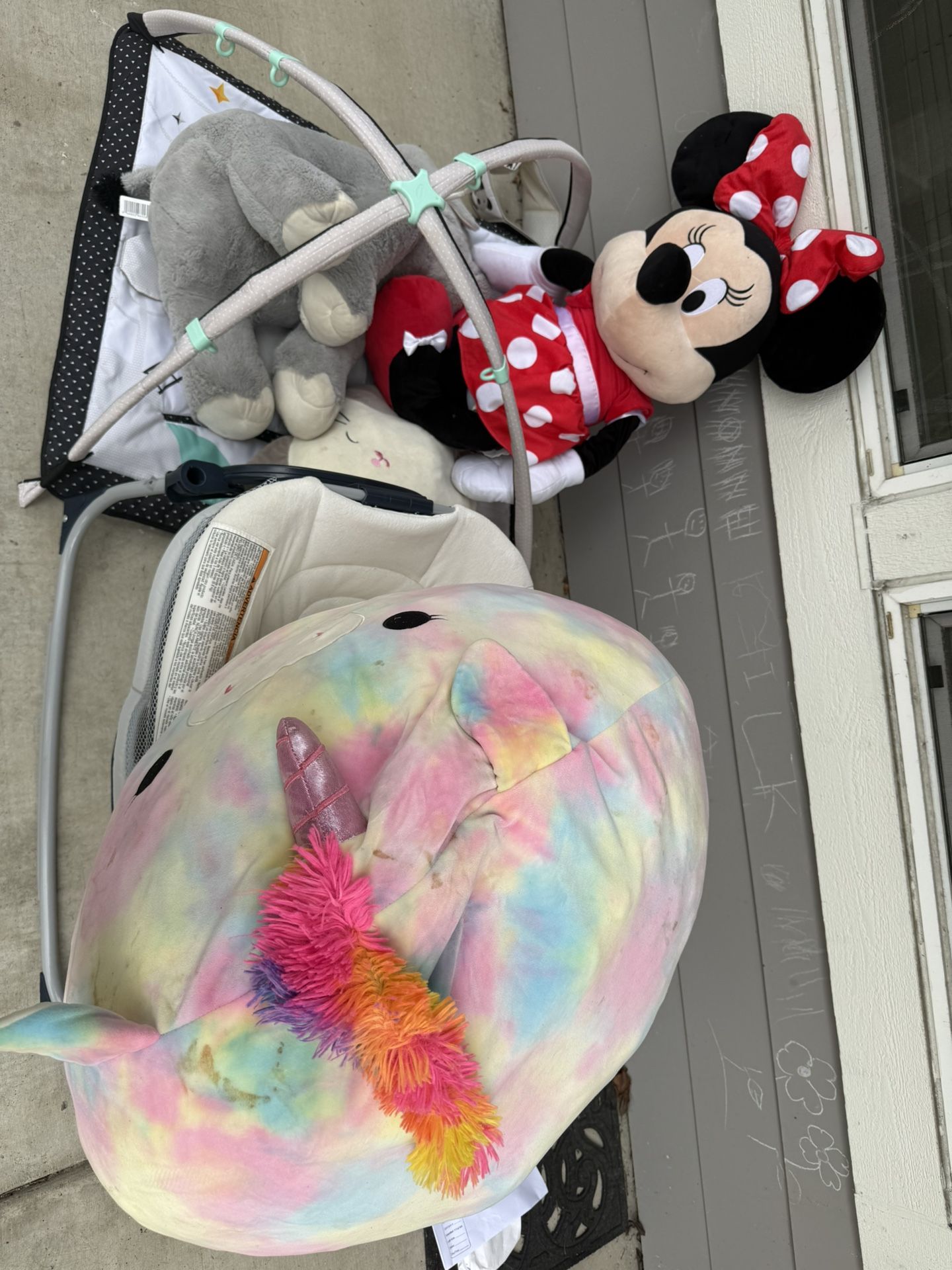 kids mat and stuffed animals