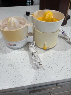 Two Vintage Electric Juicers