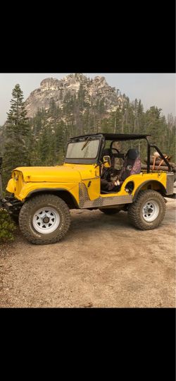 Yellow Jeep CJ Off-Road 4x4