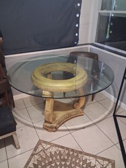 Vintage pedestal round glass table