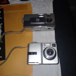 Two Throw Back Digital Cameras Both Work One Hpphoto Smsrt435, One Kodak3xaspheric Zoom