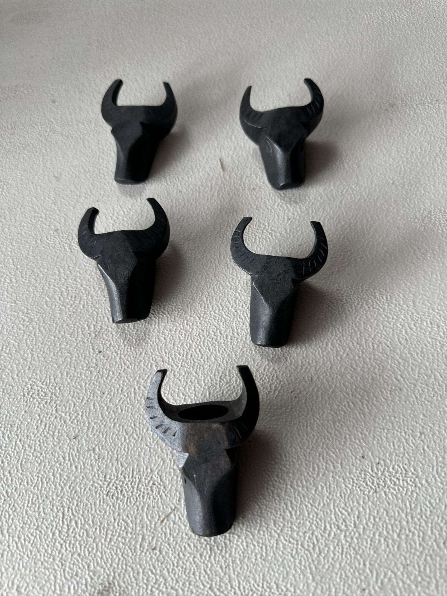 Five Vintage Hand Carved Bulls Head Napkin Rings