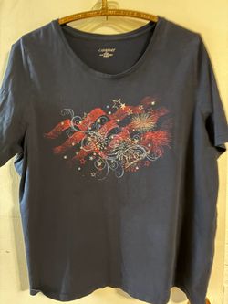 1251. Preowned Ladies Catherine’s patriotic T-shirt size 2XL  $3.00