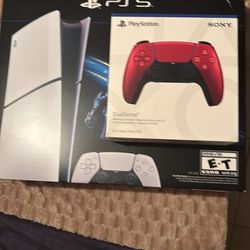 PlayStation 5 with an extra red controller