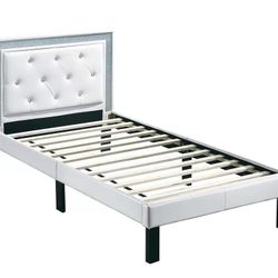 Brand new white faux leather twin platform bedframe