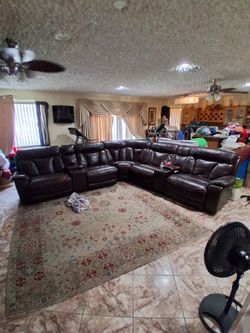 Brown leather sectional couch