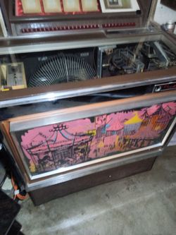 60's jukebox and 60's old coke machine