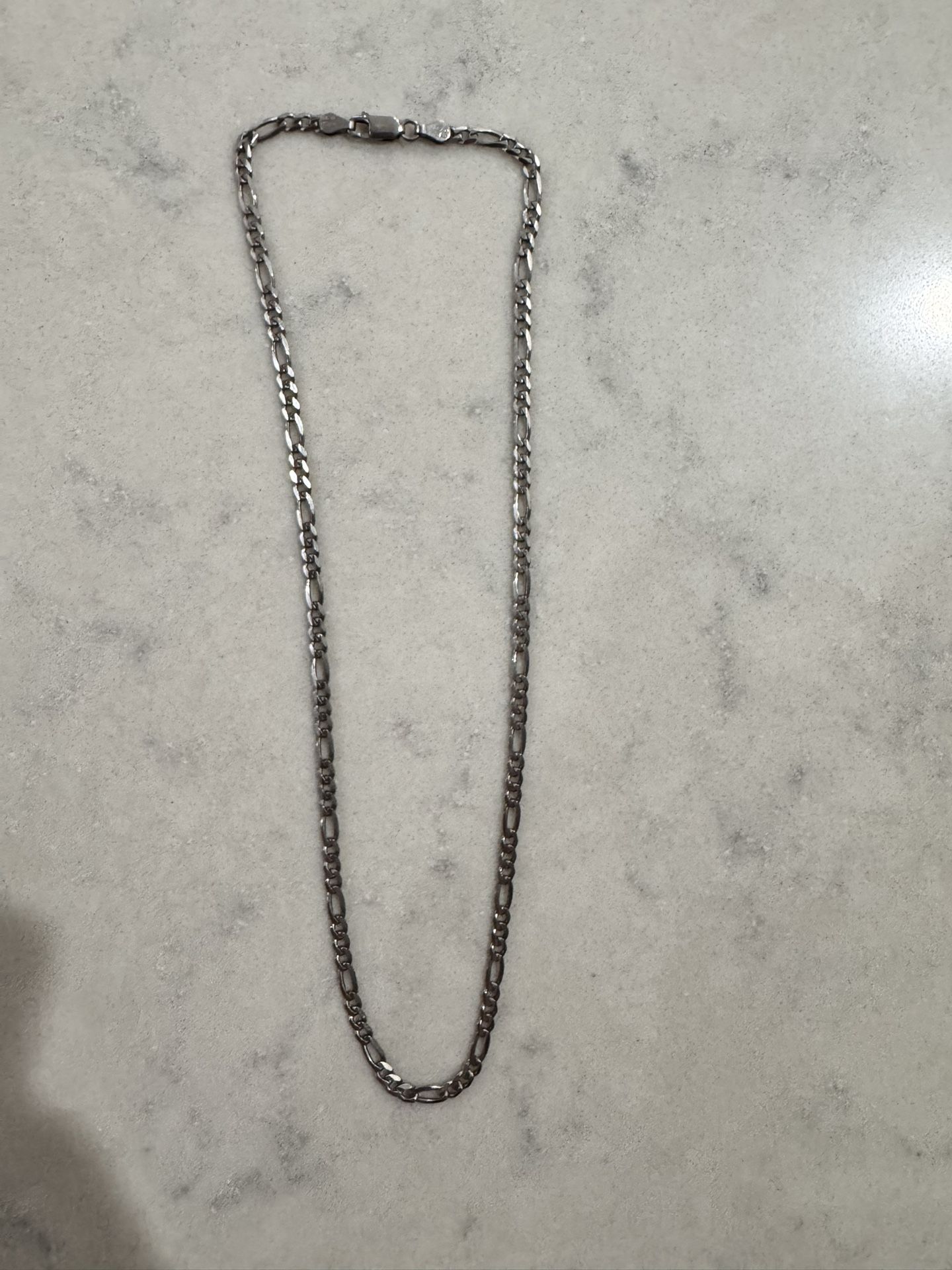 Jaxxon Silver figaro chain 18”
