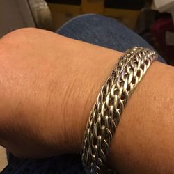 designer: Atassy Kuyumculuk, 8” long, 3/4” Wide slightly domed Sterling Silver Fancy woven bracelet marked “AK 925 Turkey” 