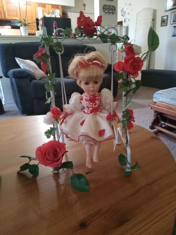 Doll On Swing