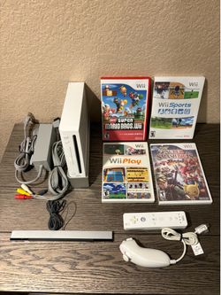 Nintendo Wii with Mario Wii Sports More