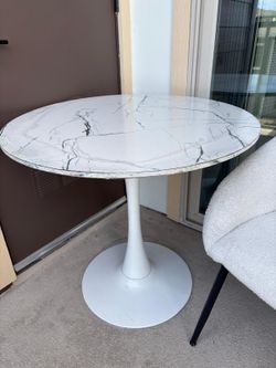 Table with a white top and legs