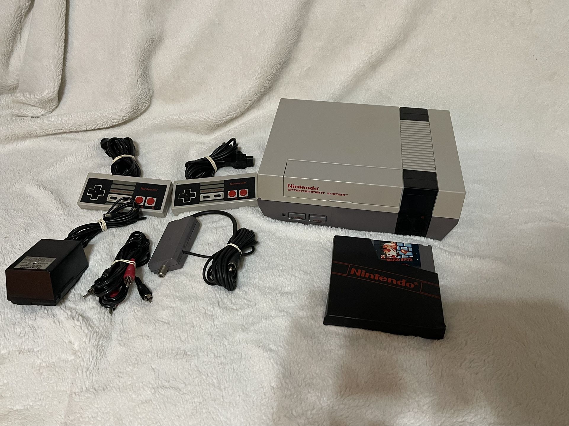 Super Nintendo Console And Super Mario Game