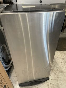 BUILT IN TRASH COMPACTOR WITH BAGS..$500 