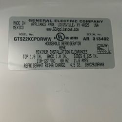 GE White Refrigerator  22  cf. Garage Ready