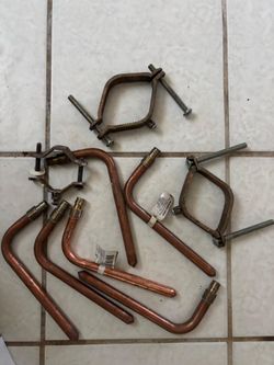 Stub out elbows (6) & brass pipe clamps