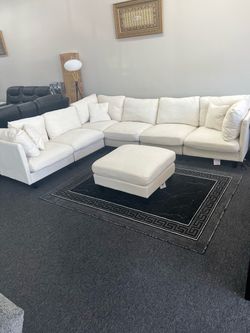 White sectional couch w Ottoman