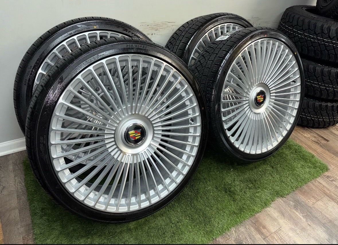 NEW 26 inch silver wheels with 305/30r26 tires