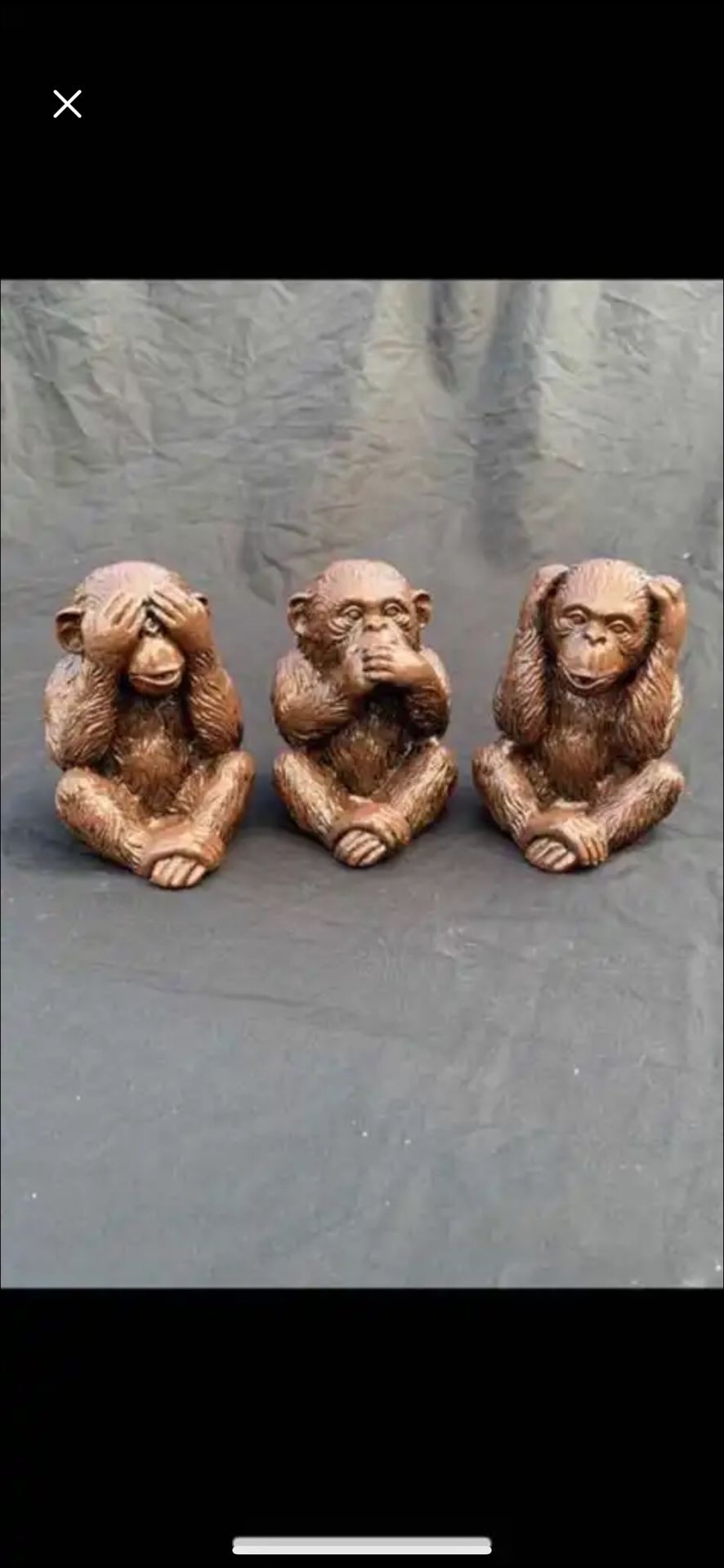 The three wise monkeys statues