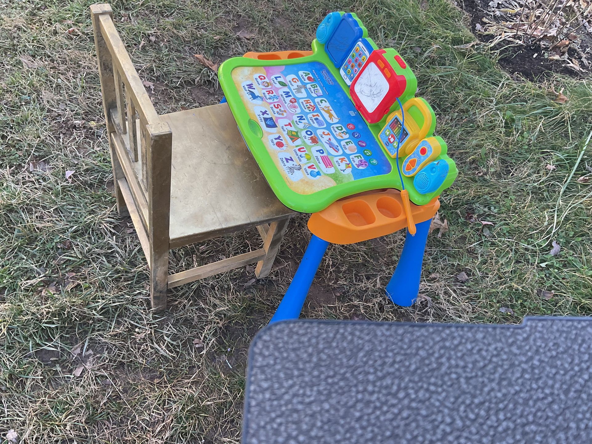 A Nice Educational Toy Desk  Come With A Chair , It Plays Music .  Also A Walking Chair