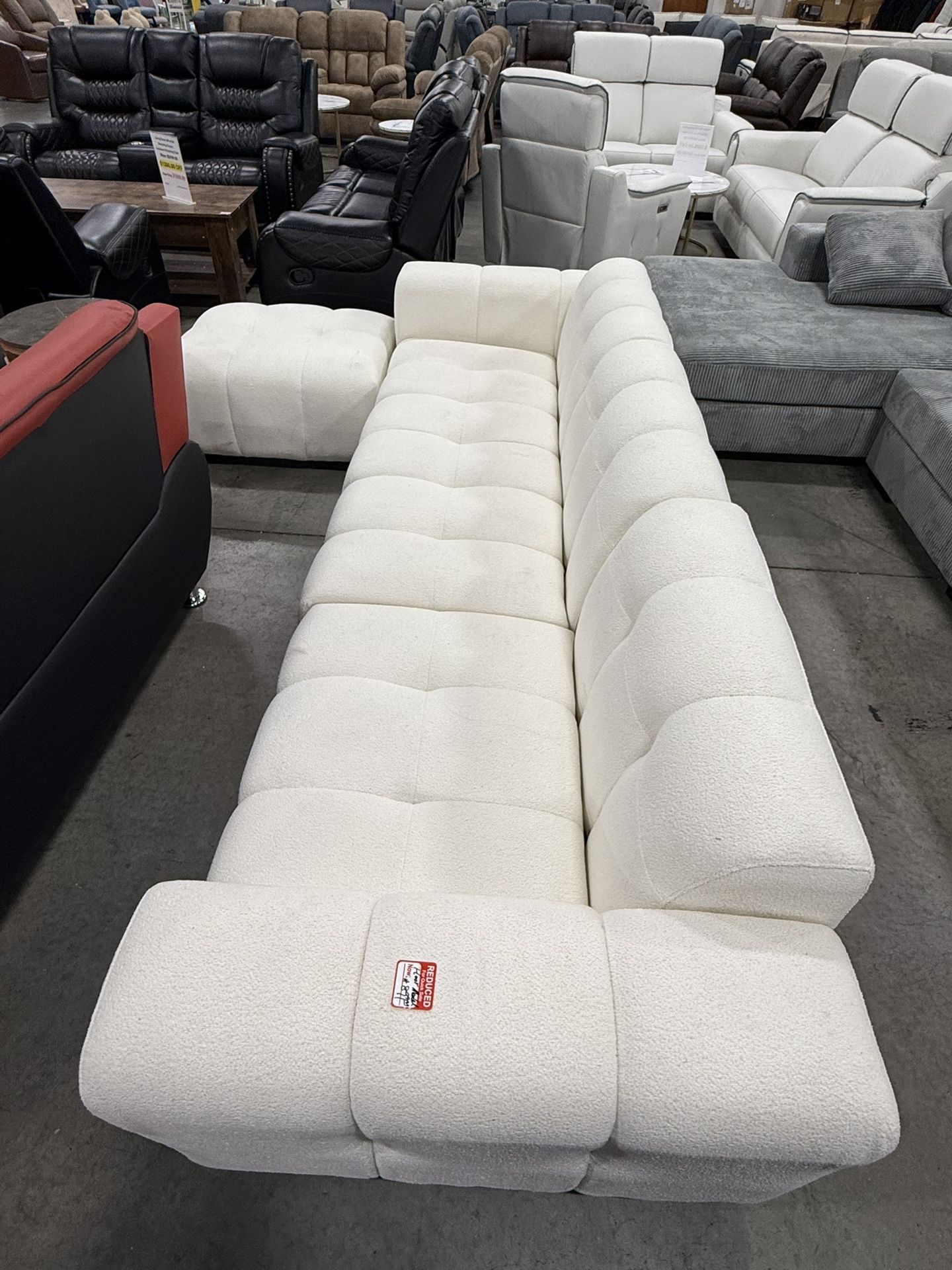 Off White Living Room Sectional With Ottoman (Floor Model)