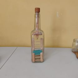 Bottle with a seat inside. Unique bottle. 